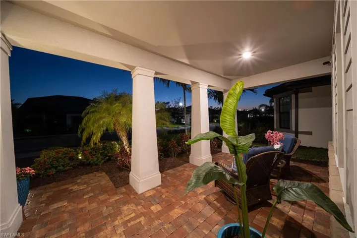 View of front entry porch at dusk