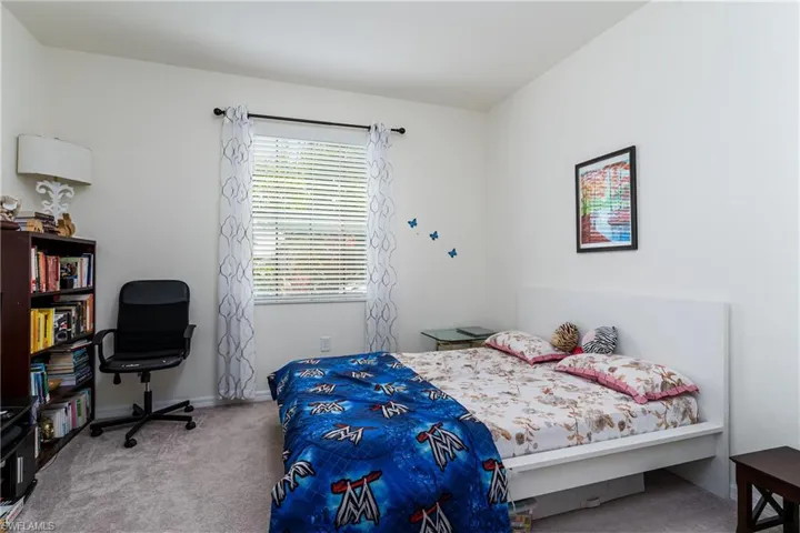 Bedroom with carpet