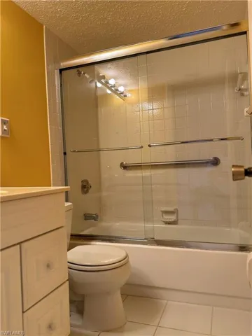 Laundry area featuring separate washer and dryer and heating unit