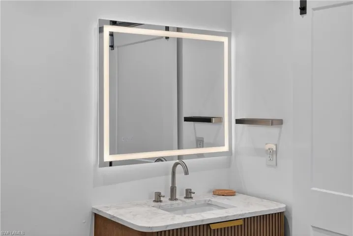 Full bath with a freestanding bath, tile walls, and tiled shower