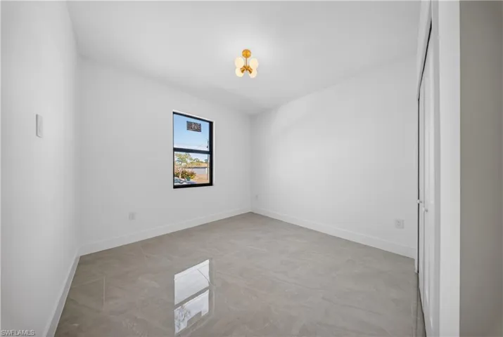 Bathroom featuring vanity and a walk in shower