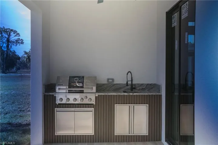 Unfurnished dining area featuring a chandelier, healthy amount of natural light, and a ceiling fan