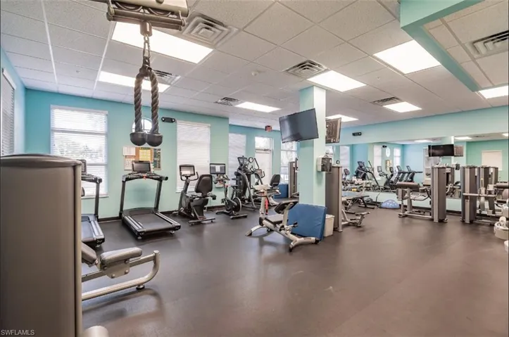 Gym room with ample exercise equipment