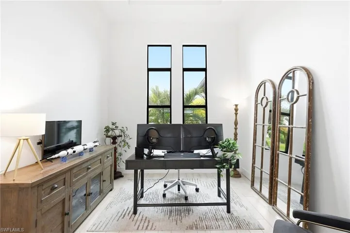 Office with light wood-type flooring