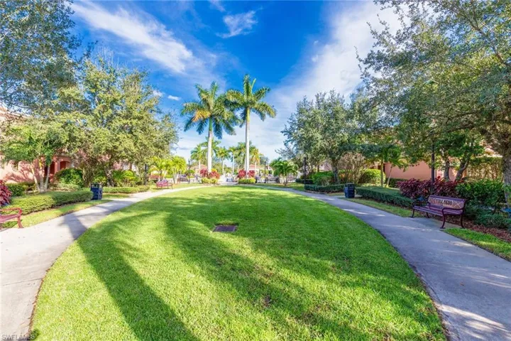 View of community featuring a yard