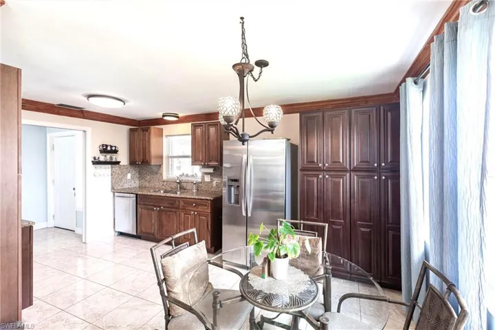 Dining area with a chandelier