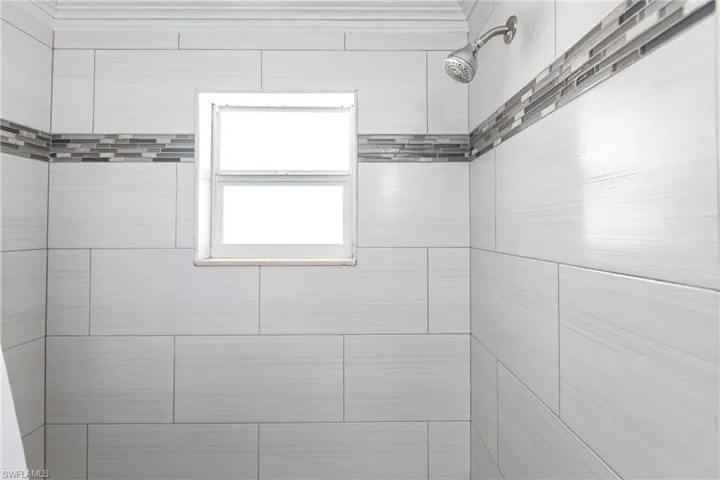 Bathroom with a tile shower