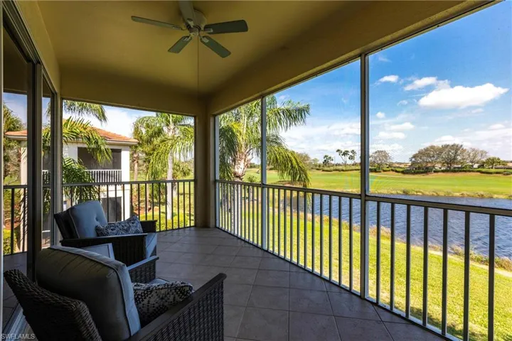 Sunroom with a water view