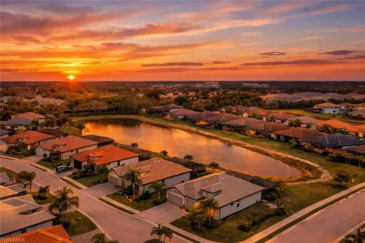 Aerial view at dusk of a residential view and a water view