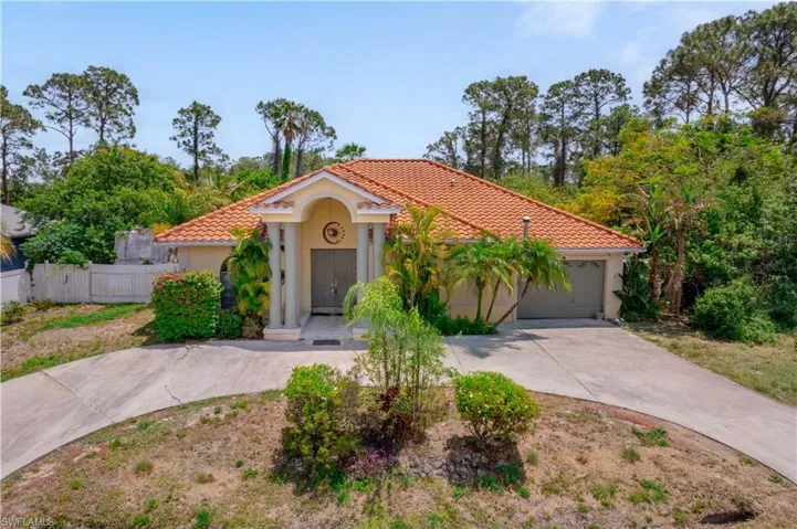 810  Mc Arthur  AVE, Lehigh Acres, FL 33936