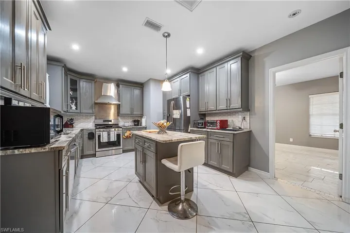 810  Mc Arthur  AVE, Lehigh Acres, FL 33936