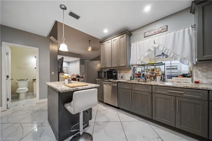 810  Mc Arthur  AVE, Lehigh Acres, FL 33936