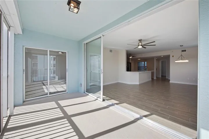 View of patio featuring a ceiling fan