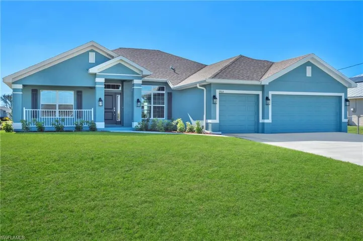 Ranch-style home featuring roof with shingles, stucco siding, a front lawn, concrete driveway, and an attached garage
