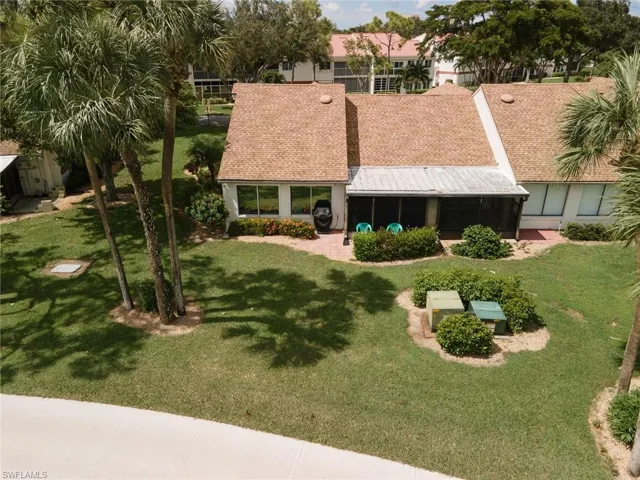 View of front of property with a front yard