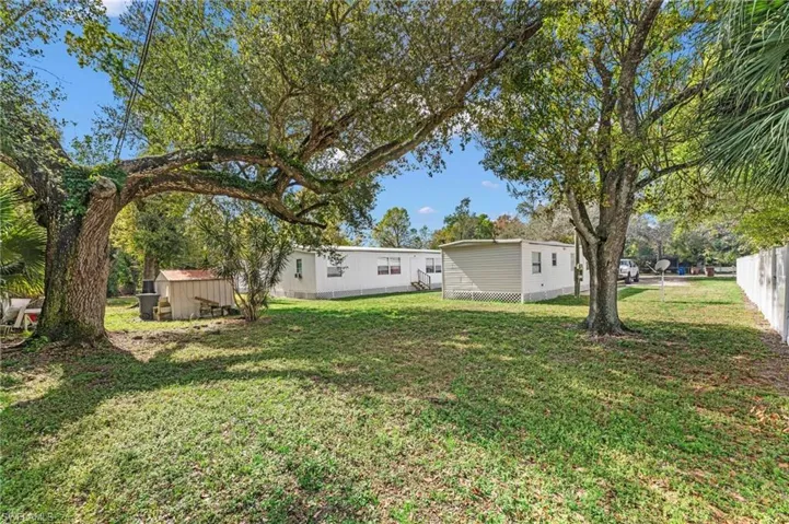 View of yard featuring a storage shed