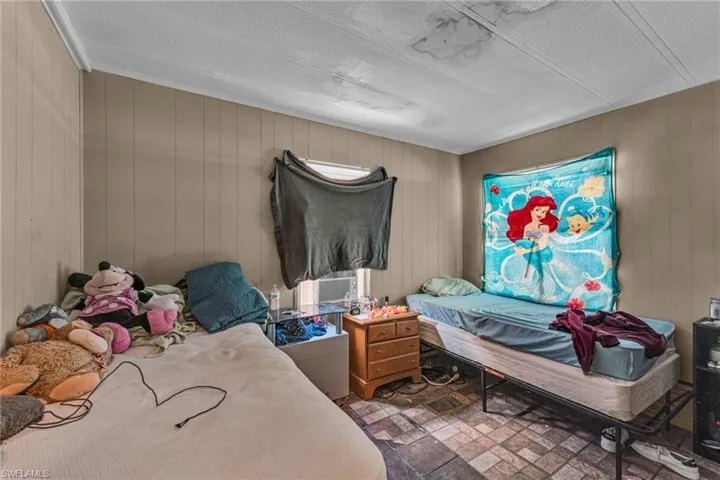 Bedroom featuring cooling unit