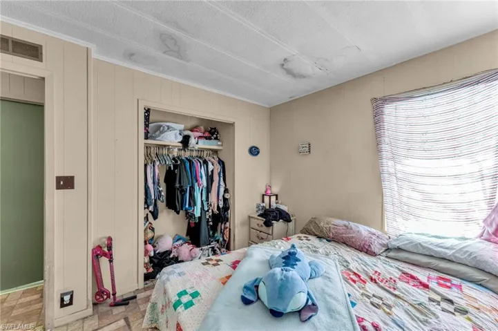 Bedroom featuring a closet