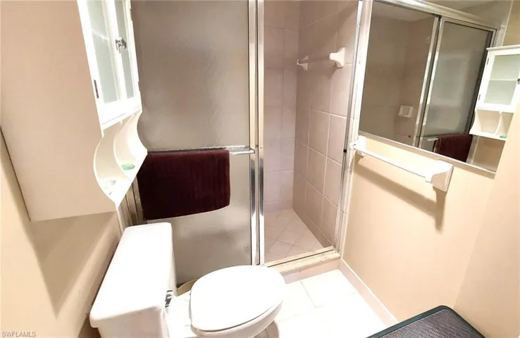 Master Bath tiled shower and WC