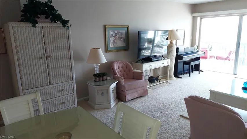 Entertainment Wall with Piano and Storage Cabinet