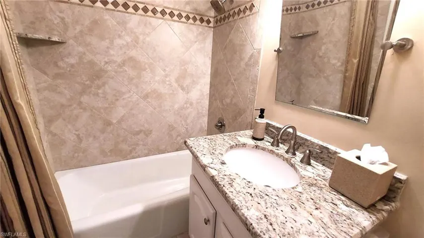 Guest Bath with tub/shower and raised vanity