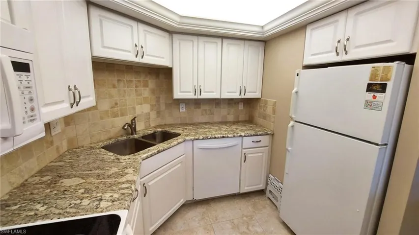 U shaped kitchen with lots of storage