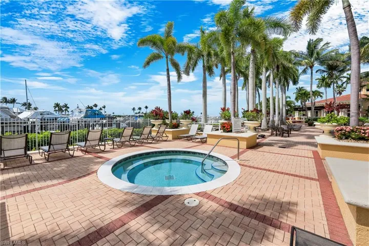 Enjoy resort-style amenities including the expansive community pool and spa
