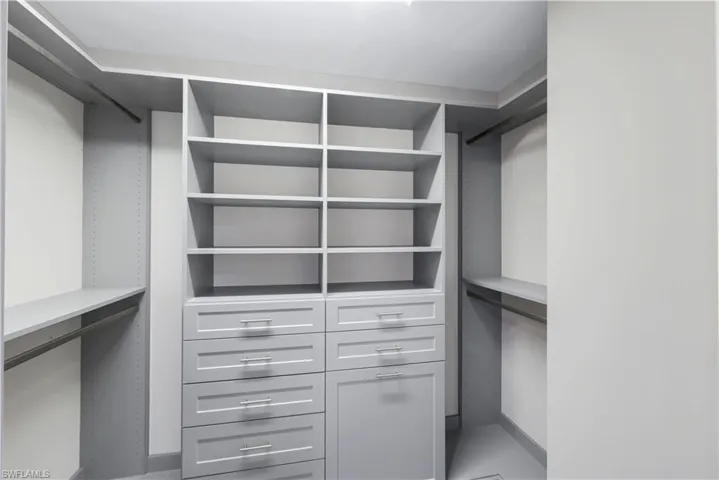 Custom-designed primary suite closet #2