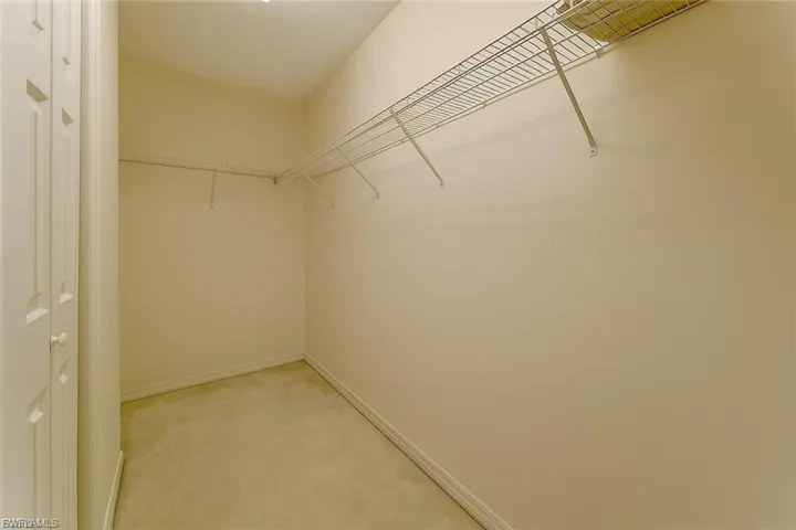 Primary Walk-in closet with ample space for everything you need"