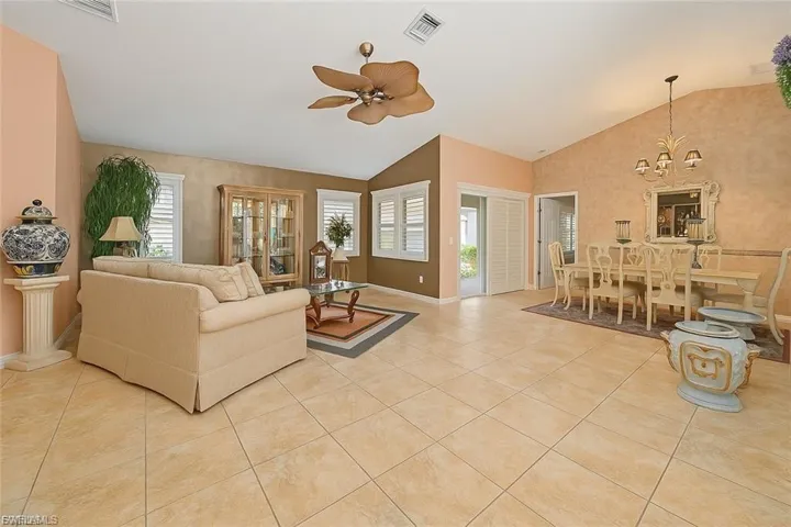 “Bright and open living area with vaulted ceilings and abundant natural light.”