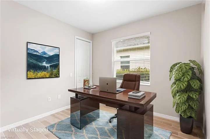 Office featuring light wood finished floors and baseboards