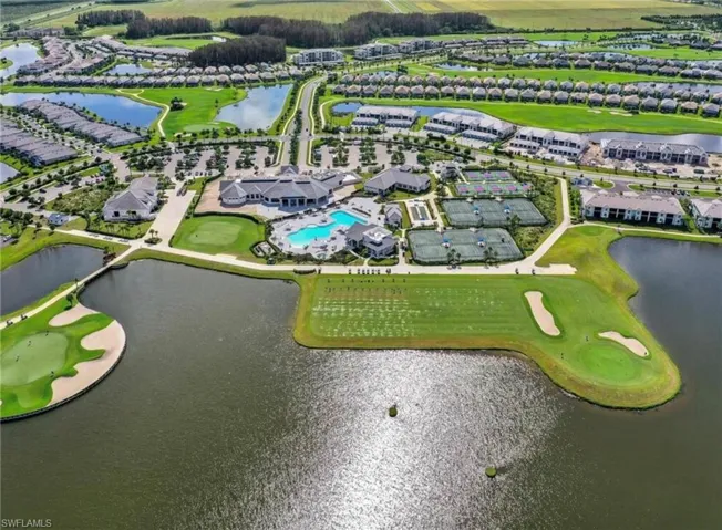 Aerial view of a large body of water and a local golf course