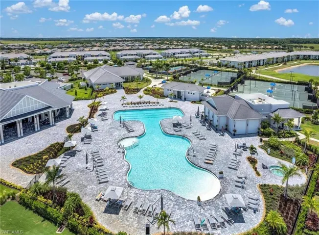Community pool with a patio area