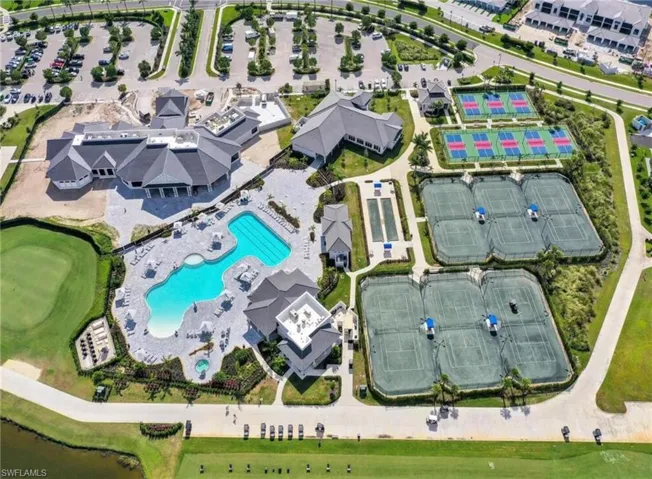 Aerial view of property's location featuring a pool area