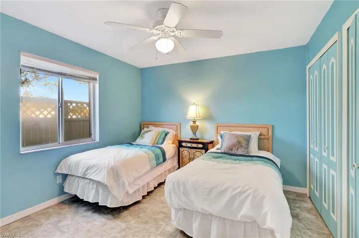 Bedroom featuring a closet and ceiling fan