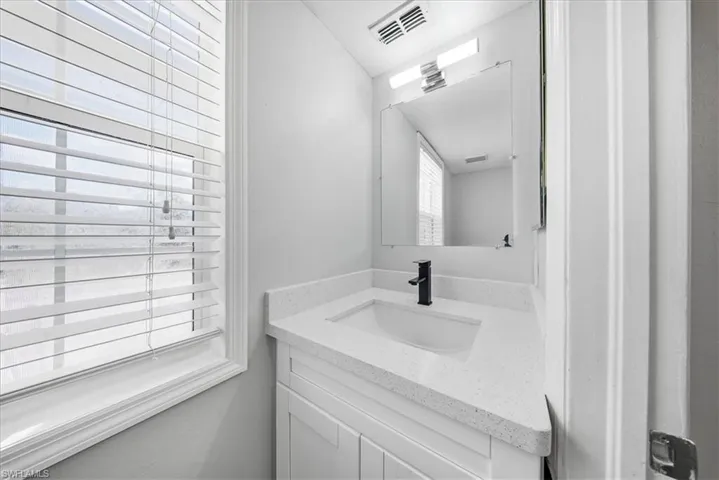 Bathroom featuring vanity