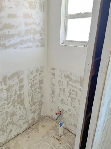Plumbed for 1/2 bath & Laundry hook-up