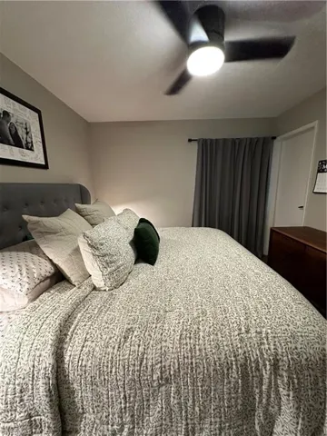 Bedroom with a ceiling fan