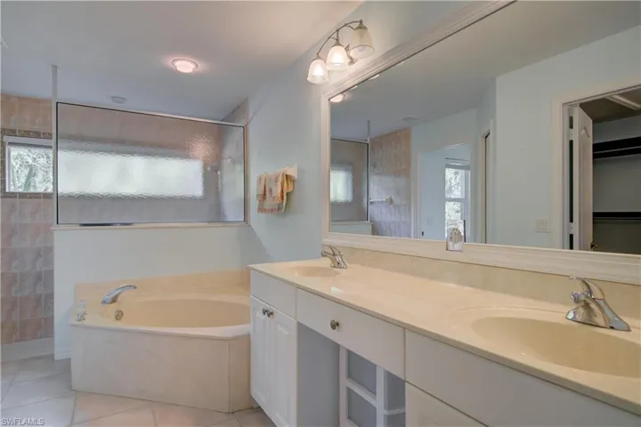 Master bathroom with double sink, soaking tub and walk-in shower