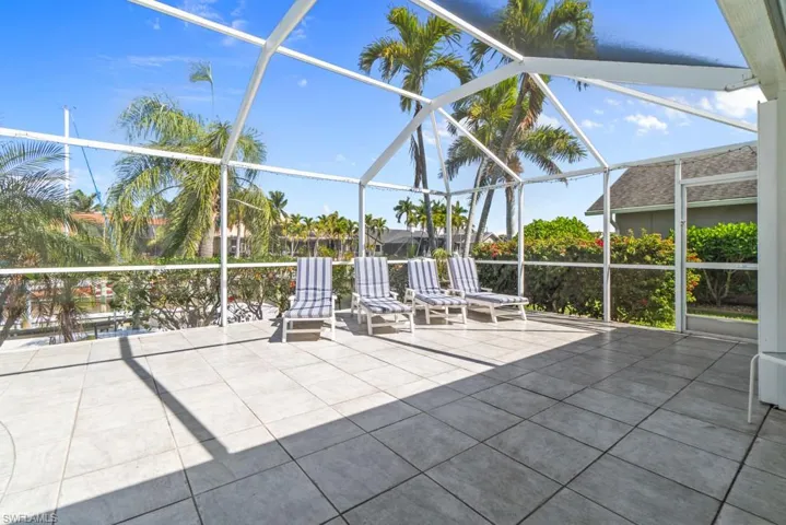 View of patio / terrace with a lanai and a sunroom
