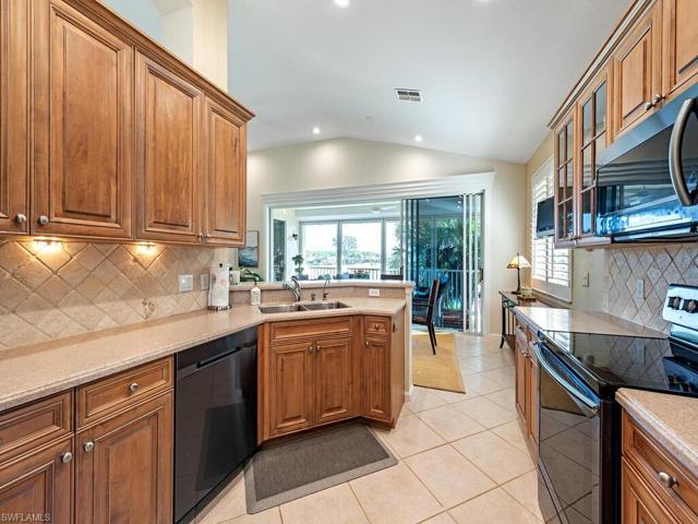 Double entry into the kitchen allows easy access to the dining area as well as the sitting area.