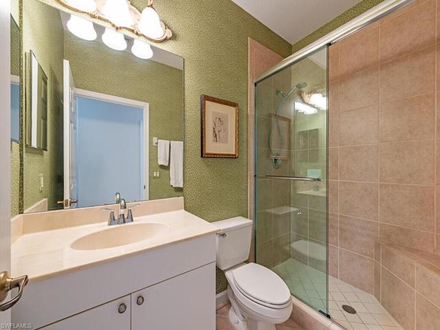 The guest bathroom with walk-in shower is located in the hall across from both guest bedrooms.