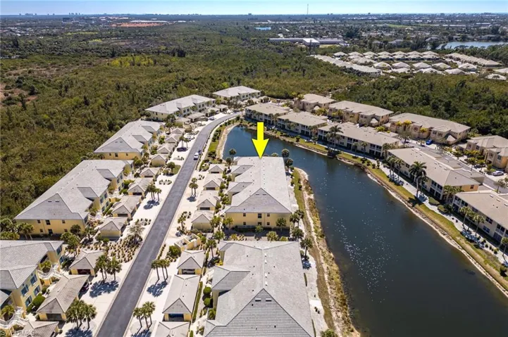 Aerial view of residential area with a nearby body of water
