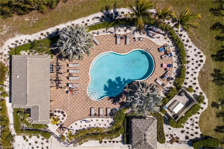 Aerial view of property's location with a pool