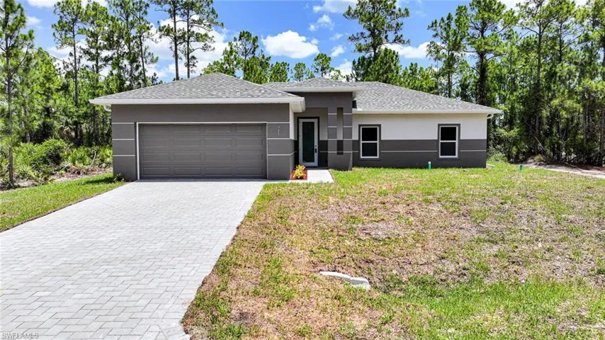 Lovely Brand New Canal Side 3 Bedroom (Plus Private Home Office/Den/Or 4th Bedroom) 2 Bathroom/2 Car Garage Home In Lehigh Acres, FL