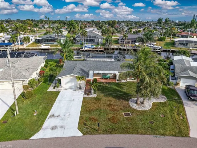 Aerial view of residential area with a large body of water