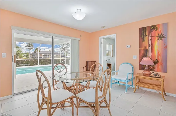 Tiled dining area with baseboards