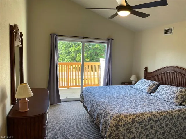 5462- Master Bedroom Upstairs with Vaulted Ceiling and Balcony.