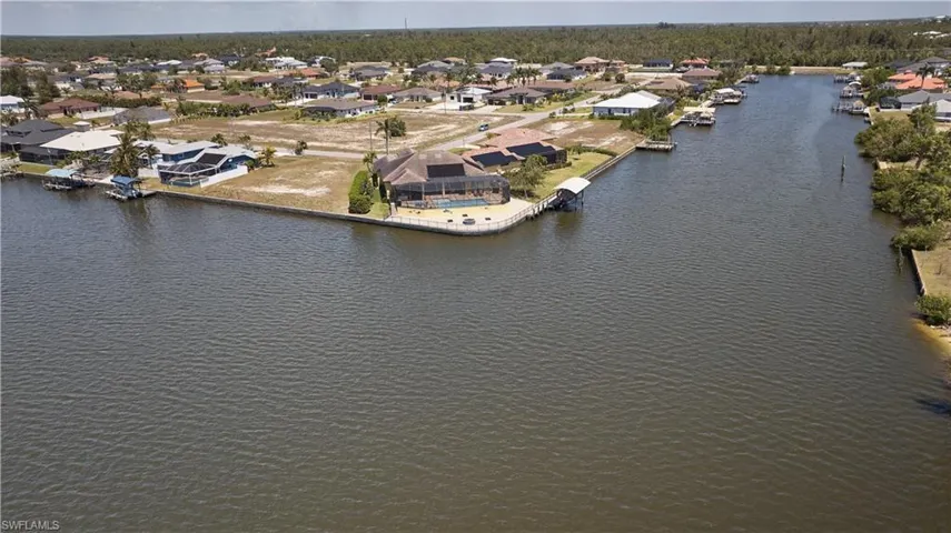 Bird's eye view featuring a water view and a residential view