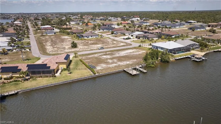 Bird's eye view featuring a residential view and a water view